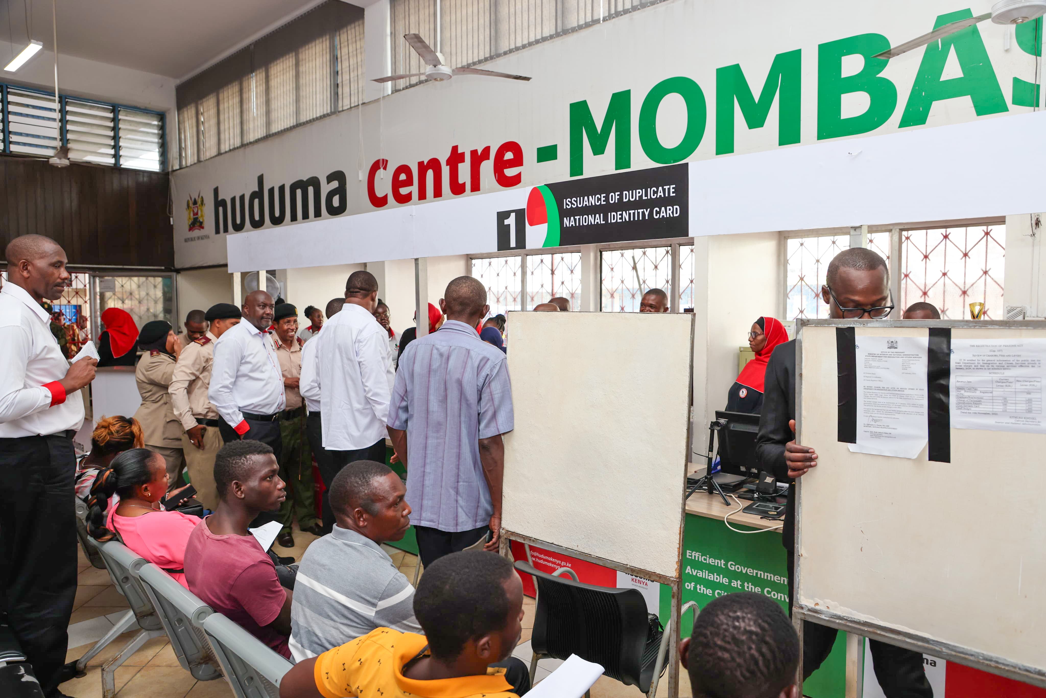 CS interacting with Huduma staff as he assess service Mombasa